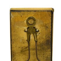 Untitled [Orange, yellow and maroon flower bouquet in light blue vase]