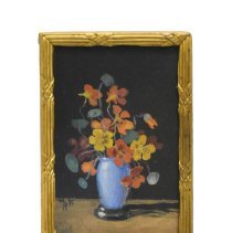 Untitled [Orange, yellow and maroon flower bouquet in light blue vase]