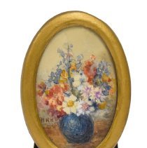Untitled [Full flower bouquet in round blue vase]