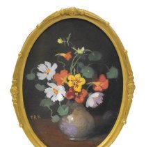 Untitled [White, orange and yellow flower bouquet in grey/beige vase]