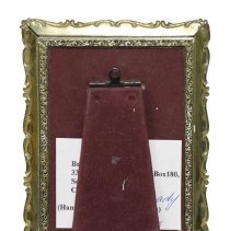 Untitled [Pink flower bouquet in dark blue vase]