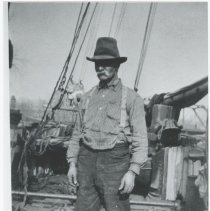 Unidentified man at a marina - Front