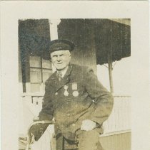 Unknown man on a bicycle.