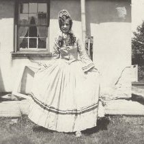 Cora Paull in dress and Grandma Paull in background