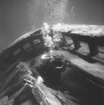 Diver exploring the tug Alice G.
