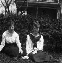 Lily and Florence sitting on lawn
