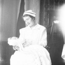 Bruce with nurse: five days old