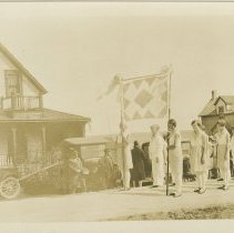 Parade in front of houses