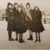 Women standing in the snow