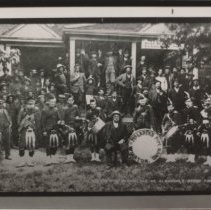 John McIvor's home with pipe band