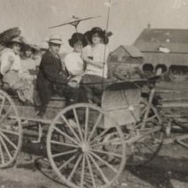 William Weir driving a horse and buggy