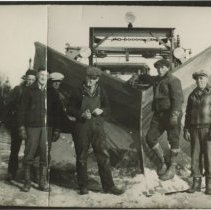 Group of people with a snow plow