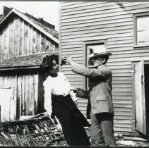 Man and woman outside of barn