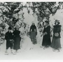 Winter snowshoeing scene 1900 front