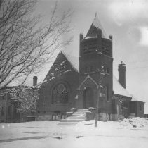 K-81-13-34 Church with arched stained glass window and a small turret