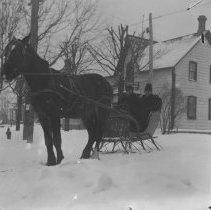 K-81-13-04 Adults in sleigh.