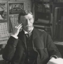 J.H. Scougall in his office
