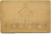 Students posed in front of schoolhouse, possibly Tippecanoe County or Montg