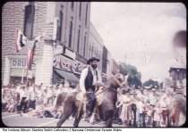 Man wearing early-settler dress in Warsaw Centennial Parade, Warsaw, Indiana, July 5, 1954