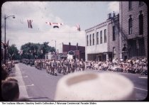 Military procession in Warsaw Centennial Parade, Warsaw, Indiana, July 5, 1954
