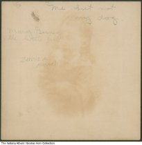 Woman with a dog and bicycle, Indianapolis, Indiana, circa 1899