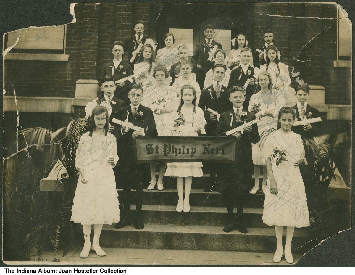 Students with diplomas at Saint Philip Neri School, Indianapolis