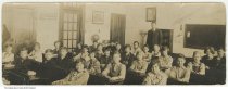 Children and teacher inside a classroom, possibly Wabash, Indiana, circa 19
