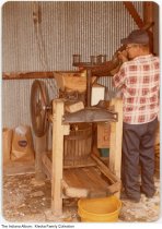 Curt Lorenzen making cider, Fort Wayne, Indiana, 1979