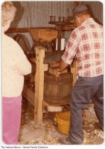 Curt Lorenzen making cider, Fort Wayne, Indiana, 1979