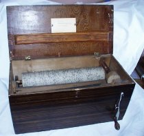 Old exhibit label thum tacked to inside cover.