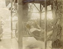Man Sleeping in a Hammock