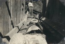 Man at the end of a pipe