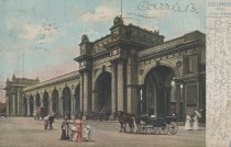 Postcard of exterior of Union Station with people and horse-drawn carriages
