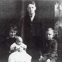 Red Ellie holding Lue-Wilfred