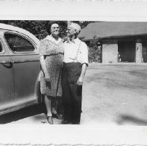 Fred and Bertha Wilkins Next to Car