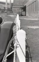 American Steel and wire Close up of a car next to a road guard WHMLuce-8615
