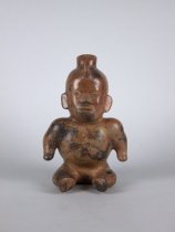 Seated Dwarf with Shaman Horn Headdress