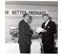 Harold Purcell receiving food preservation certificiate