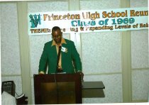 Photo copy of Joseph Lee delivering the reunion greetings , 2008