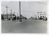 Sepia-toned glossy photo showing a view along Gratiot Avenue, facing northeast at Harper Avenue