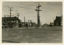 Sepia-toned glossy photo depicting a view along Gratiot Avenue, facing northeast from Harper Avenue