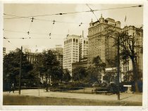Sepia-toned glossy photo of Grand Circus Park and adjacent buildings