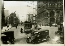 A sepia-toned film negative depicting Michigan Avenue as viewed from Campus Martius
