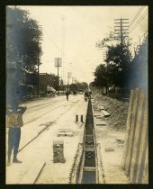 Sepia-toned photo showing underground electrical conduits being constructed beneath Fort Street