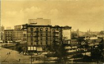 Monochromatic postcard depicting an elevated view of Cadillac Square at Monroe Street, facing north