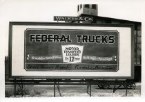 Black and white photographic print depicting a Walker & Co