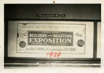 Black and white photographic print depicting a Walker & Co