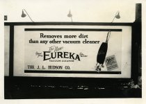Black and white photographic print depicting a Walker & Co