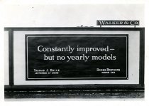 Black and white photographic print depicting a Walker & Co
