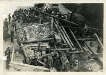 Digital scan of a sepia-toned photo taken overlooking construction beneath Randolph Street for the Detroit-Windsor Tunnel